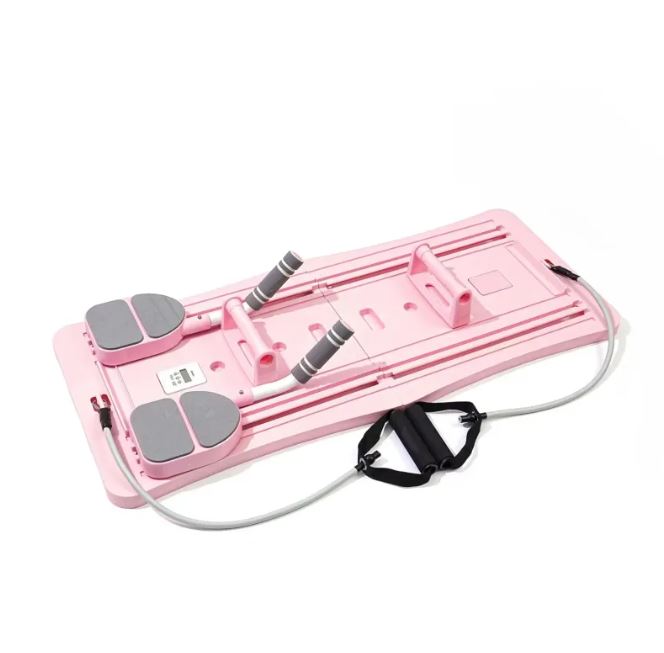 Planche Pilates coulissante compacte rose, cordons et poignée de transport