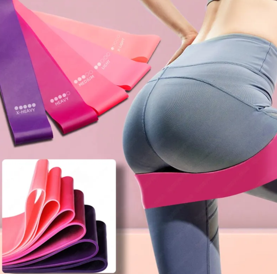 Ensemble de bandes de résistance en boucles rose, violet et bleu superposées.