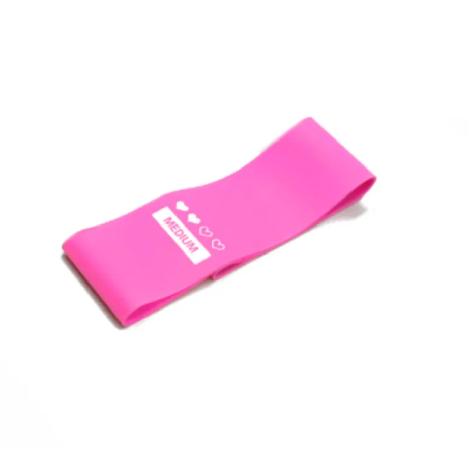 Bande de résistance en boucle rose marquée MEDIUM.