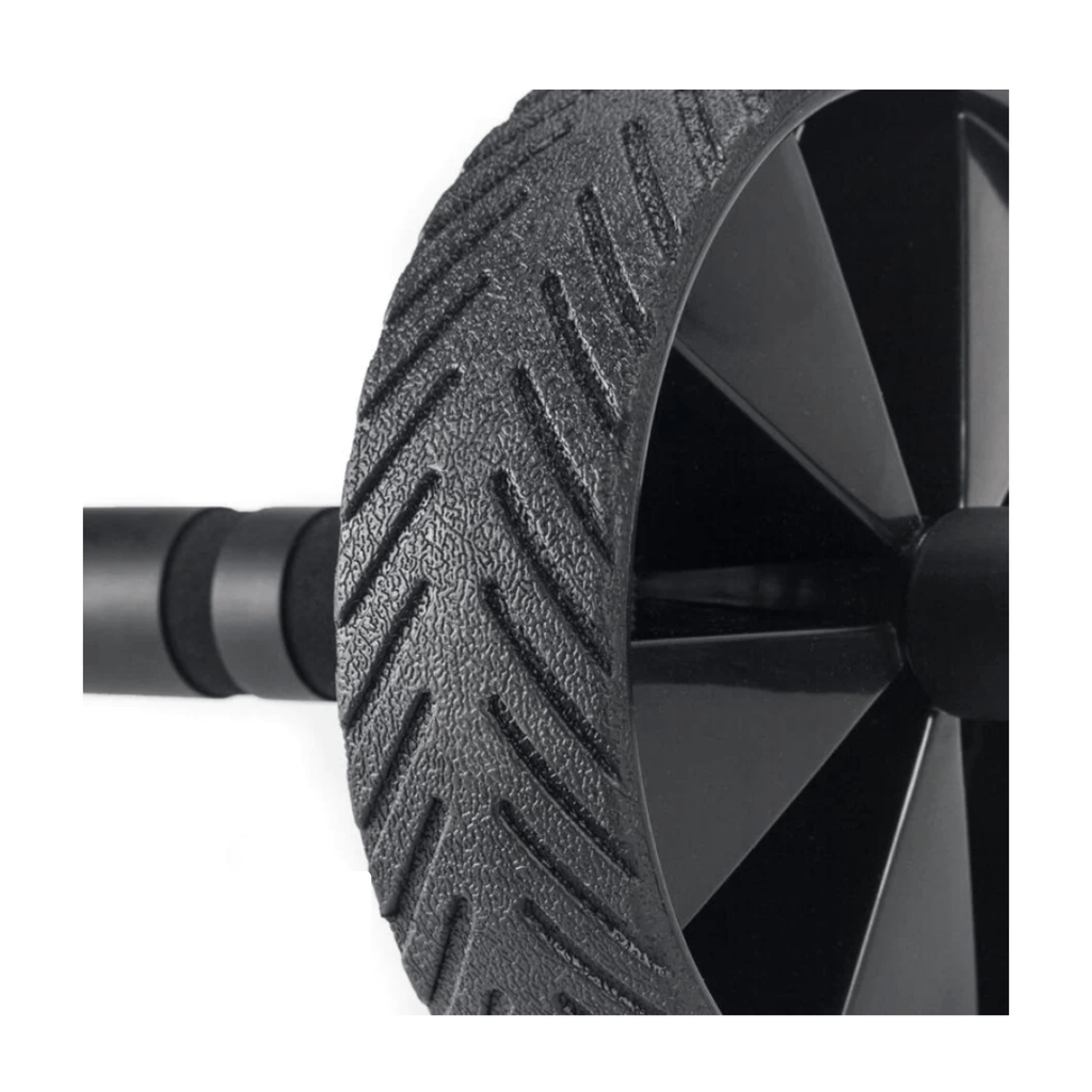 Roue d’abdominaux noire avec relief antidérapant sur le bord