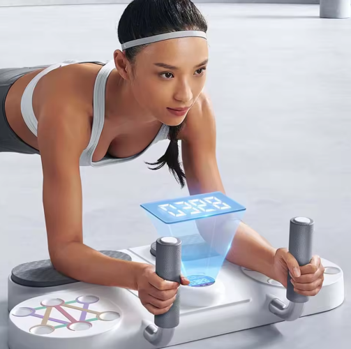 Barre de soutien pour pompes avec coussinets gris et affichage bleu, utilisée allongée par une femme