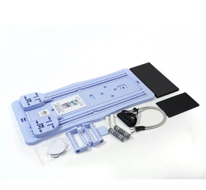 Planche Pilates coulissante compacte mauve avec accessoires et sangles noires